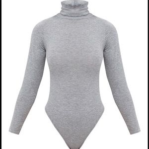 Grey turtleneck bodysuit from pretty little thing